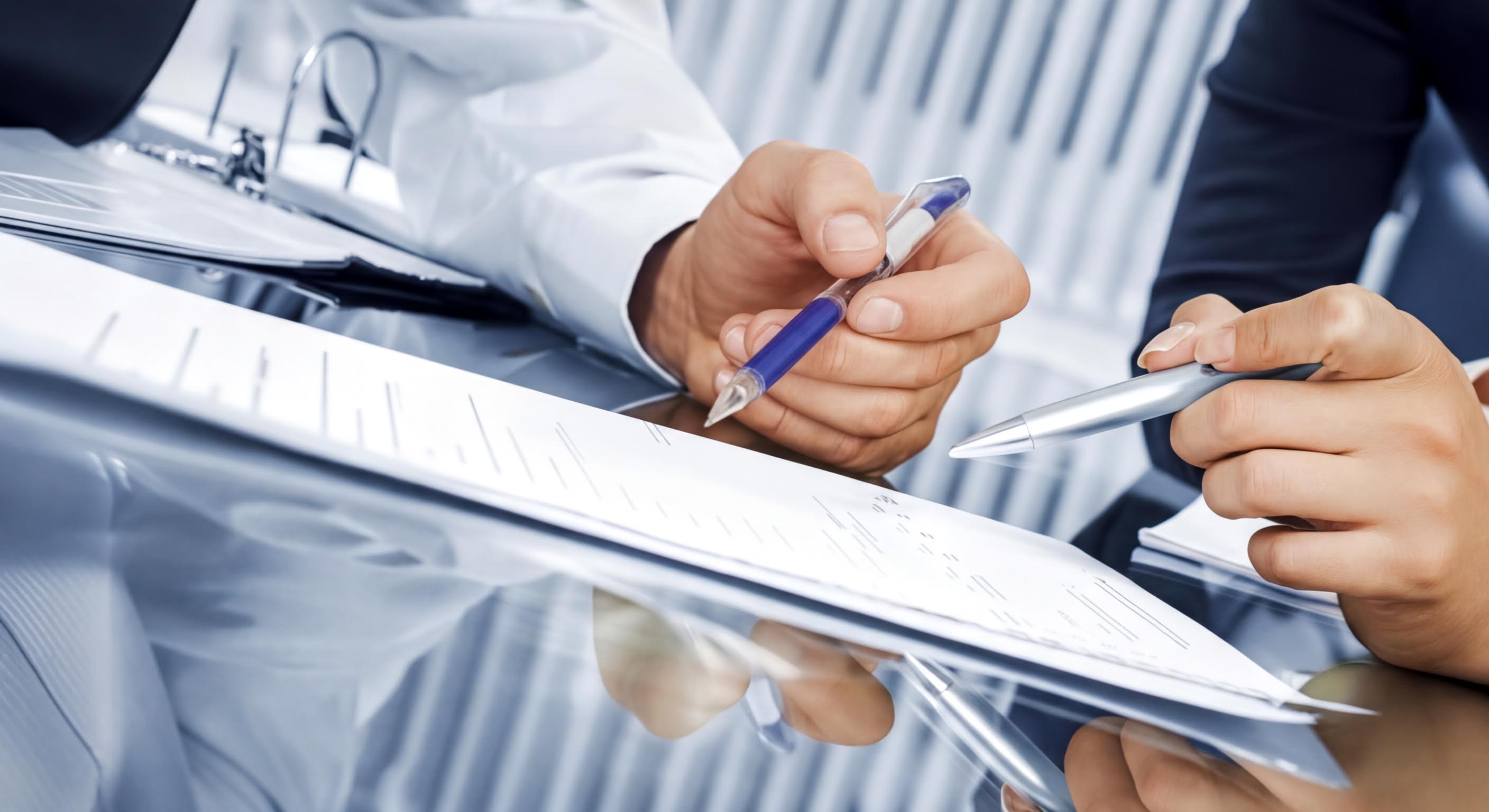 Business professionals discussing strategies during a consulting session.